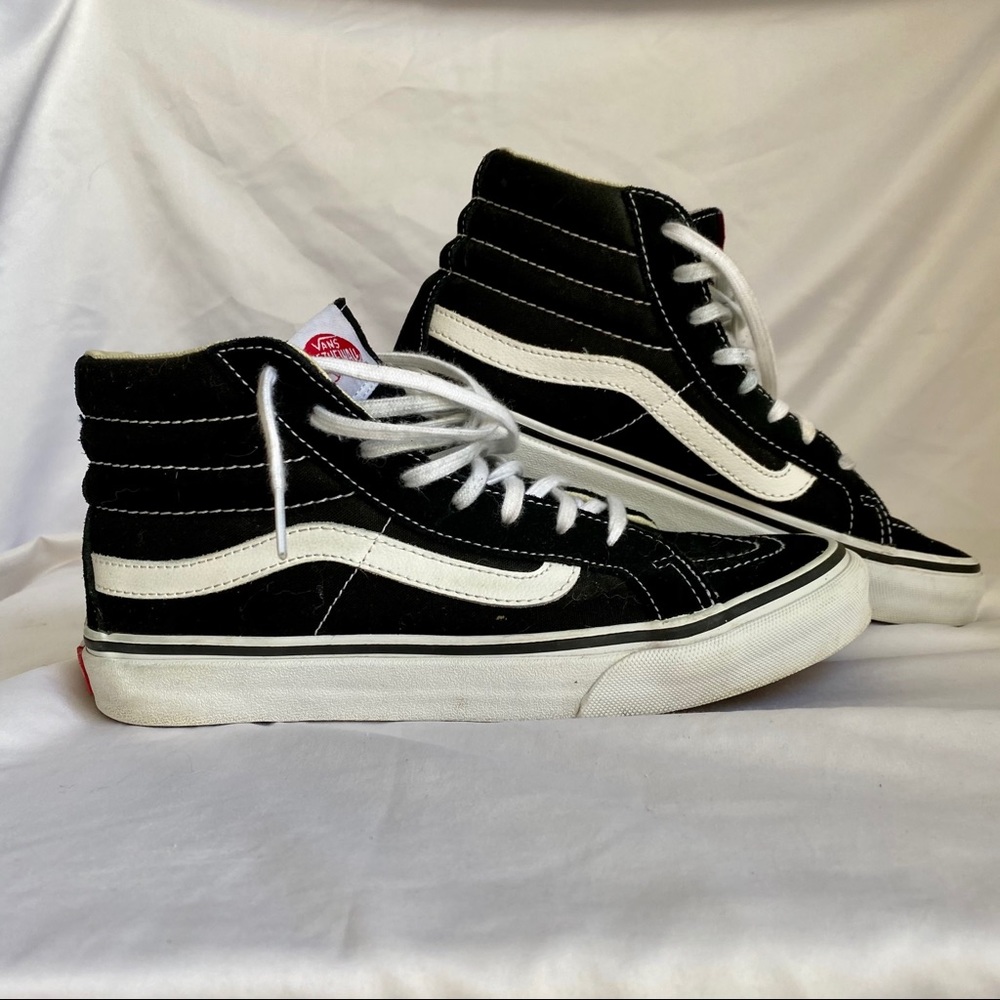 Black high top Vans shoes